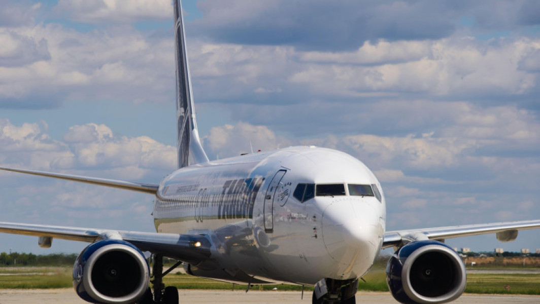 Guvernul a plătit TAROM aproape 4 milioane pentru zboruri ale Ciucă și Ciolacu